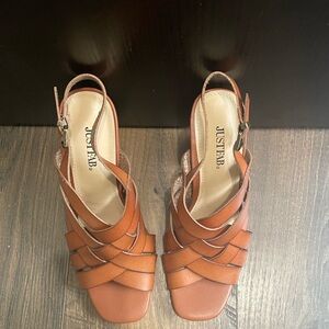 Just fab brown heels  with strap in back. NWOT